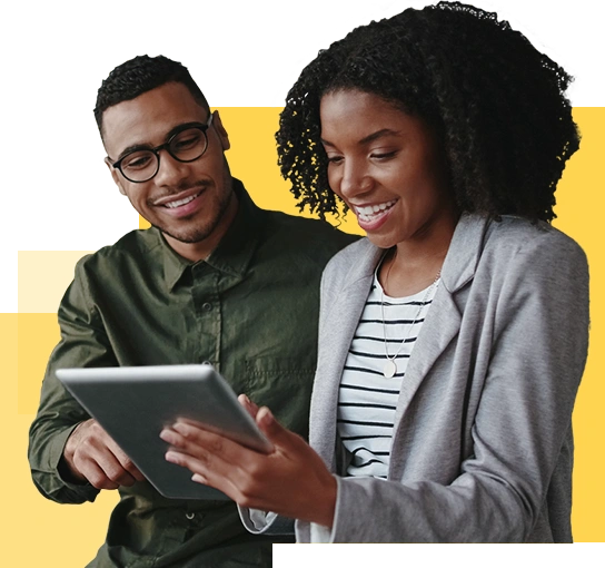 two marketers looking at a tablet