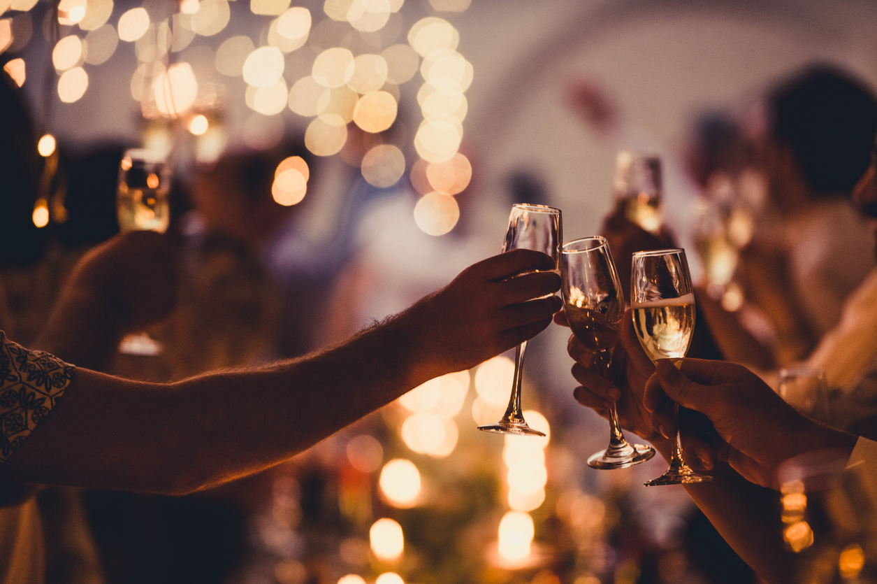 Celebratory Toast with String Lights and Champagne Silhouettes The “Gleamers” - Why Small Wins Matter More Than Ever in 2026
