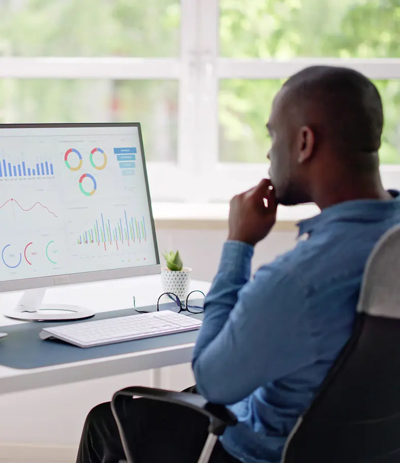intro-man-at-computer-iStock-1493925417 marketer examining data on a computer